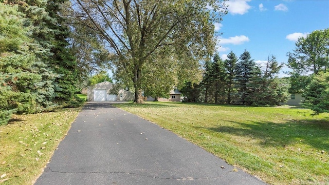 view of road with driveway