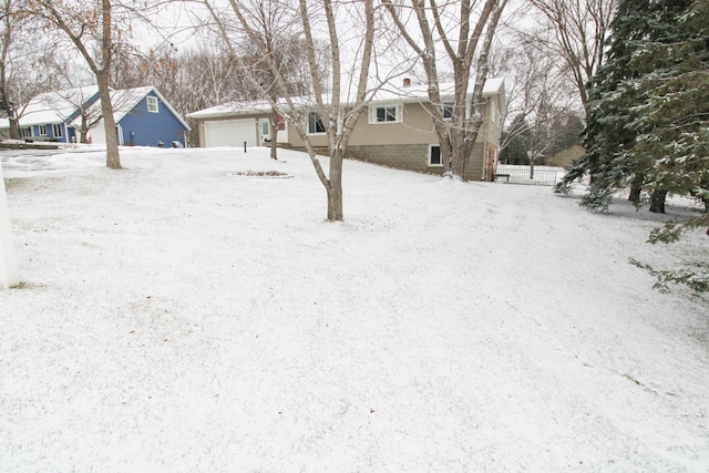 view of yard covered in snow