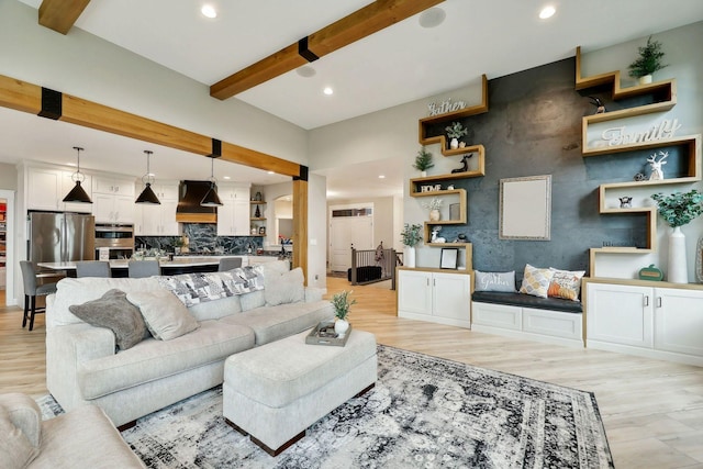 3028 Pinewood Rd SE, Rochester, MN 55904 - living room featuring beamed ceiling, light wood finished floors, and recessed lighting