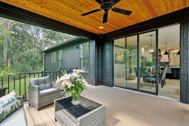 3028 Pinewood Rd SE, Rochester, MN 55904 - wooden deck with ceiling fan and an outdoor hangout area