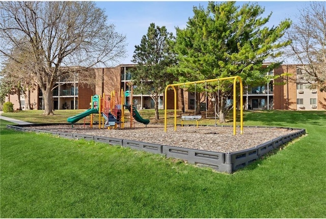 view of jungle gym with a lawn