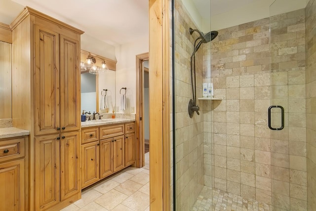 bathroom featuring vanity and walk in shower