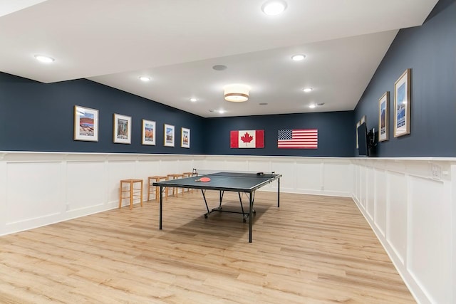 playroom with light hardwood / wood-style flooring