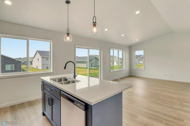 7043 Benji Ln, Fargo, ND 58047 - kitchen featuring stainless steel dishwasher, a sink, lofted ceiling, light wood-style floors, and hanging light fixtures