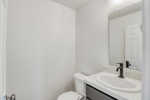 7043 Benji Ln, Fargo, ND 58047 - bathroom with vanity and toilet
