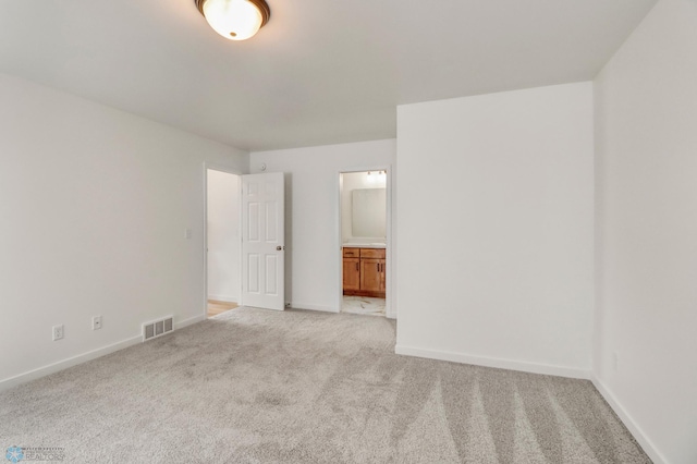 7043 Benji Ln, Fargo, ND 58047 - unfurnished room featuring light carpet and baseboards