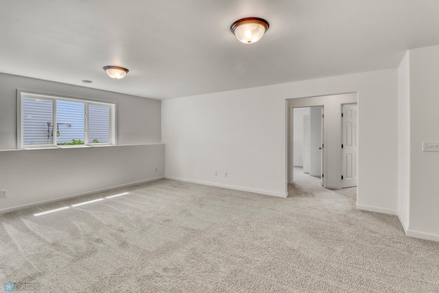 7043 Benji Ln, Fargo, ND 58047 - carpeted spare room featuring baseboards