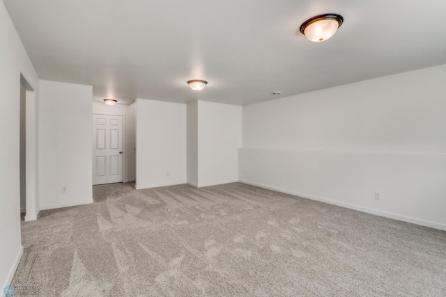 7043 Benji Ln, Fargo, ND 58047 - unfurnished room featuring carpet floors and baseboards