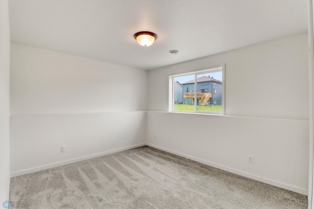 7043 Benji Ln, Fargo, ND 58047 - carpeted spare room featuring baseboards
