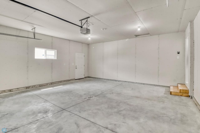 7043 Benji Ln, Fargo, ND 58047 - garage featuring a garage door opener