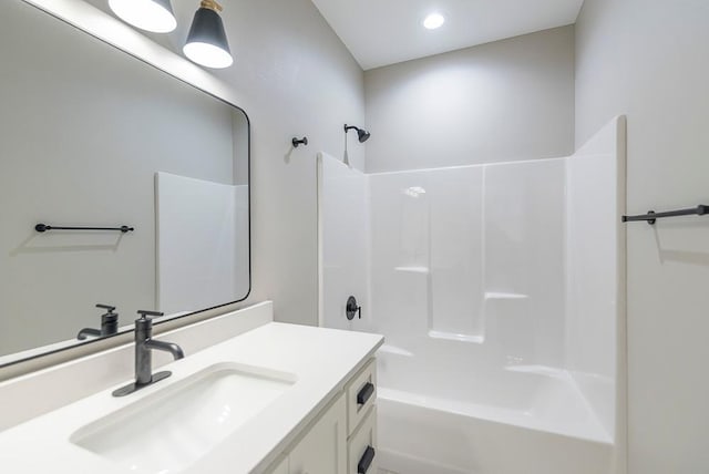 bathroom with vanity and shower / bath combination