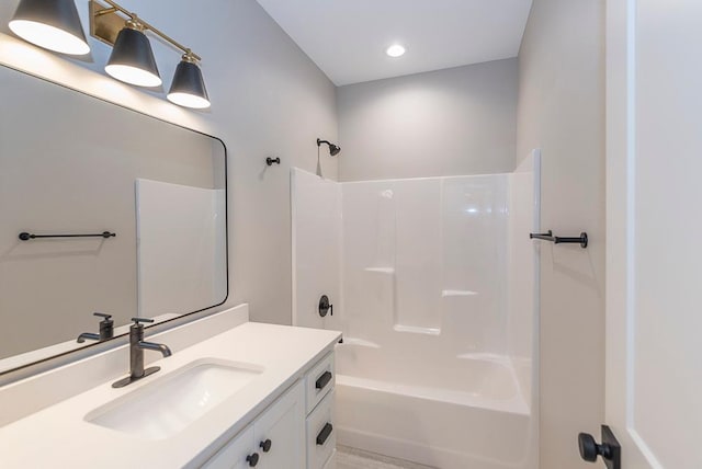 bathroom with vanity and shower / bath combination