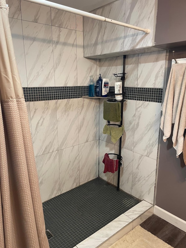 bathroom with a shower with curtain