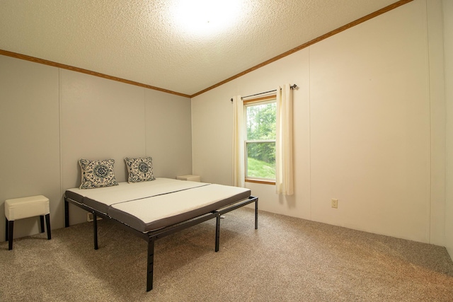 rec room with vaulted ceiling, ornamental molding, a textured ceiling, and carpet flooring