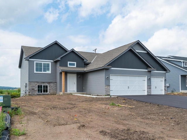 craftsman-style home featuring a garage