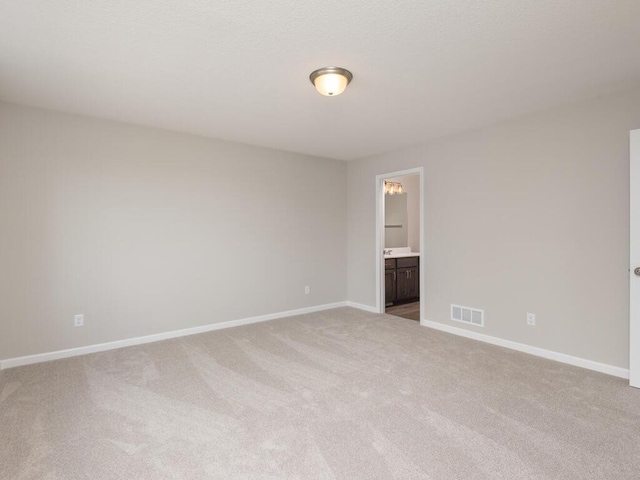 empty room with light carpet