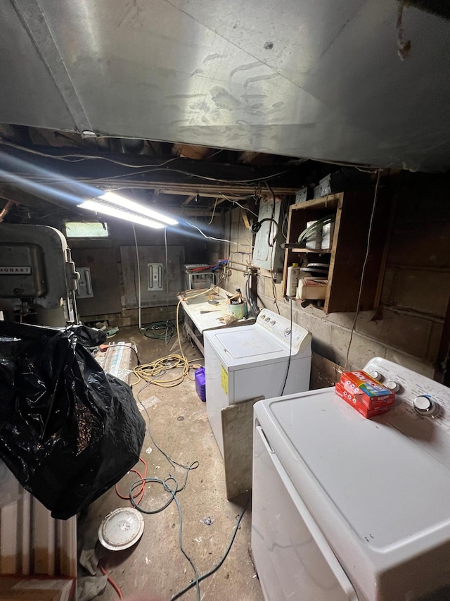 unfinished below grade area featuring washer and dryer