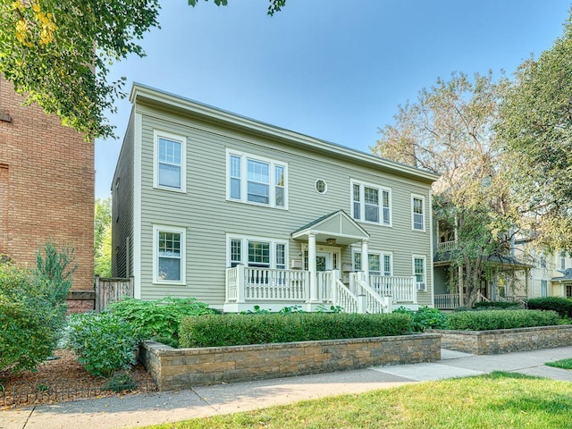 colonial-style house with a porch