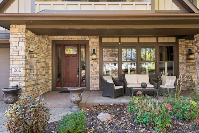 doorway to property featuring outdoor lounge area