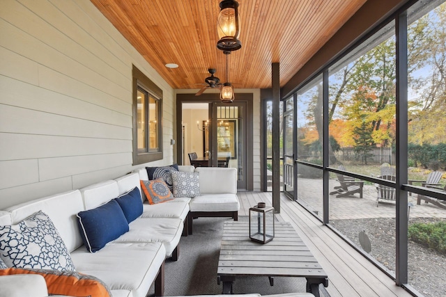 sunroom featuring wood ceiling