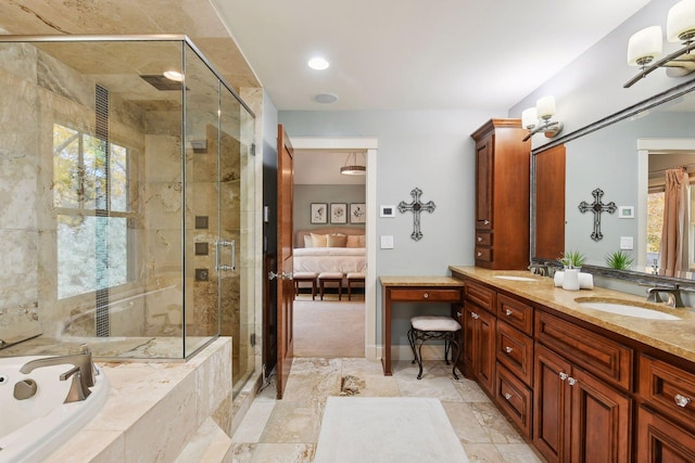 bathroom with walk in shower and vanity