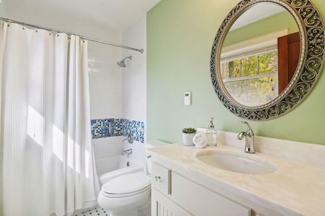 full bathroom featuring toilet, shower / tub combo with curtain, and vanity