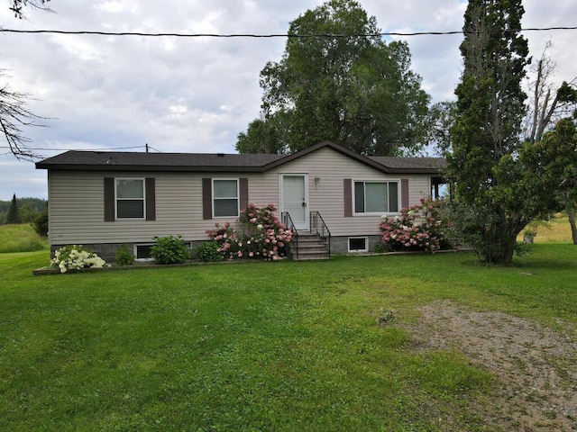 view of front of property with a front yard