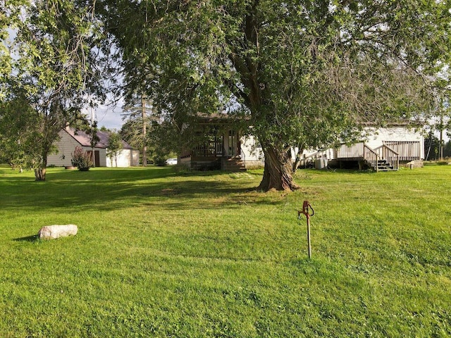 27602 County Road 51, Bovey, MN 55709 - view of yard featuring a wooden deck
