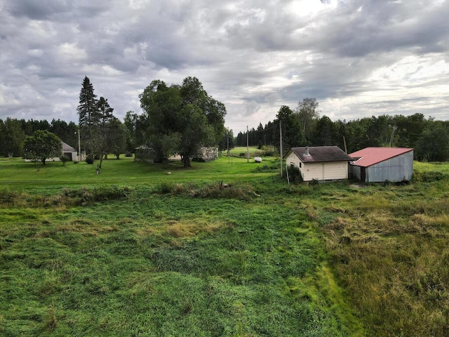 27602 County Road 51, Bovey, MN 55709 - view of yard with a rural view and an outdoor structure