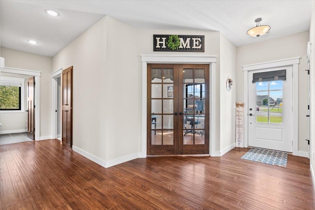 entrance foyer featuring recessed lighting, french doors, baseboards, and wood finished floors