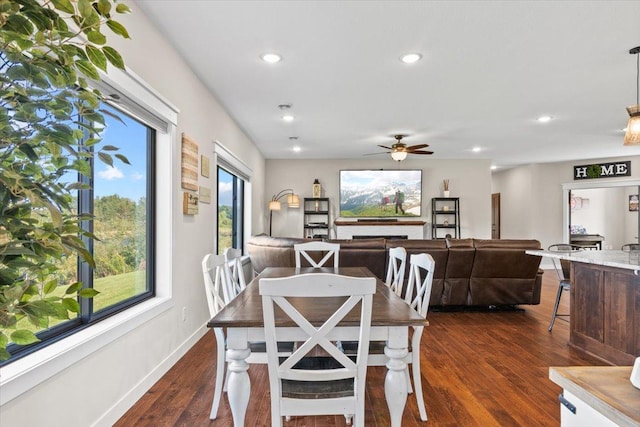 dining room with recessed lighting, ceiling fan, baseboards, and dark wood-style flooring