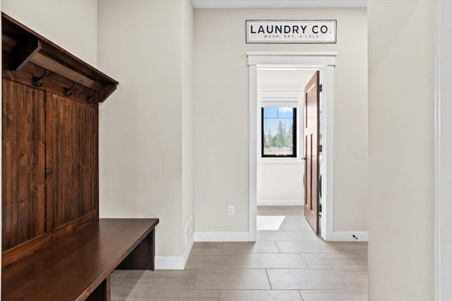 mudroom featuring baseboards