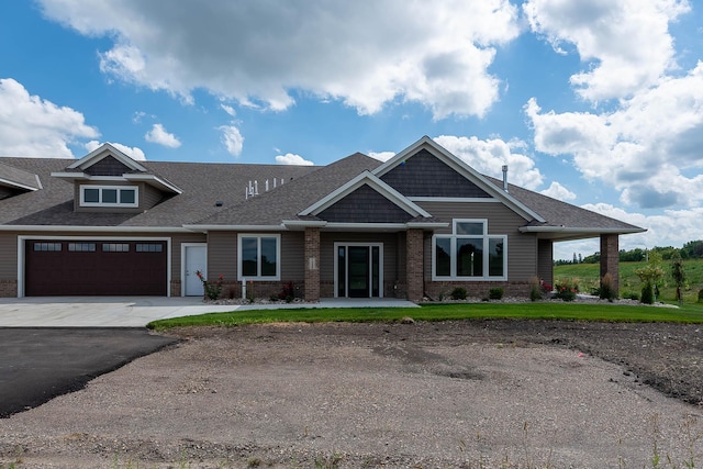 craftsman-style home with a garage