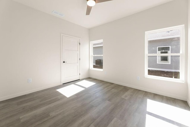 unfurnished room featuring hardwood / wood-style floors and ceiling fan