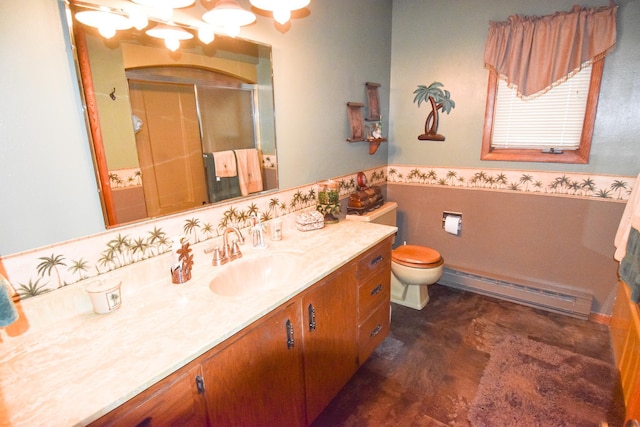 102 6th St SW, Red Lake Falls, MN 56750 - full bath with a baseboard radiator, a stall shower, vanity, wainscoting, and toilet
