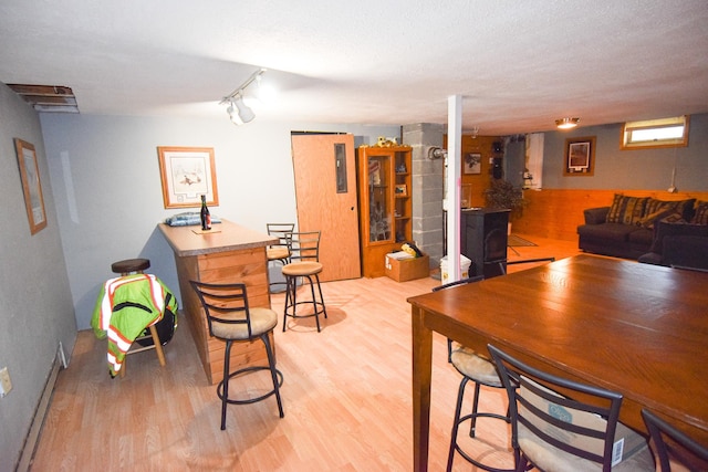 102 6th St SW, Red Lake Falls, MN 56750 - dining space featuring light wood-style floors and rail lighting