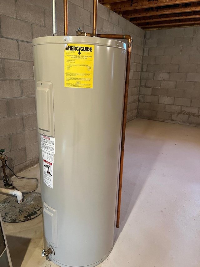 utility room with electric water heater