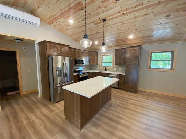 3450 23rd Ave NW, Hackensack, MN 56452 - kitchen with appliances with stainless steel finishes, a wall unit AC, wooden ceiling, a sink, and baseboards