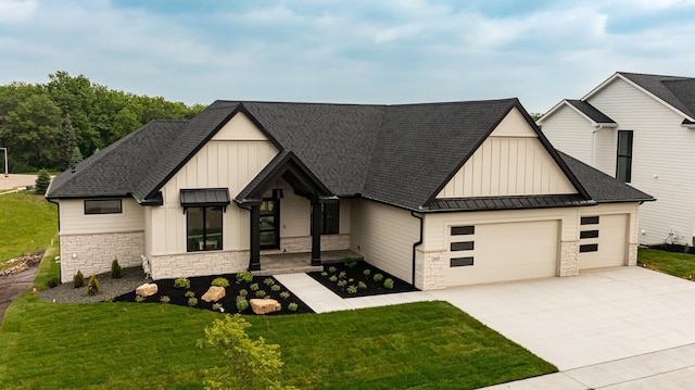2665 Timber Oaks Rd SW, Rochester, MN 55902 - modern farmhouse with board and batten siding, stone siding, a garage, and a standing seam roof