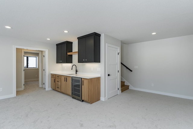 2665 Timber Oaks Rd SW, Rochester, MN 55902 - indoor wet bar featuring wine cooler, light carpet, recessed lighting, and stairs