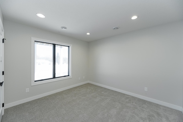 2665 Timber Oaks Rd SW, Rochester, MN 55902 - unfurnished room with recessed lighting and light colored carpet