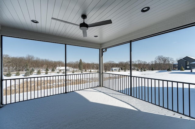 2665 Timber Oaks Rd SW, Rochester, MN 55902 - unfurnished sunroom featuring view of wooded area