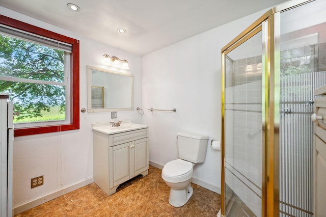 bathroom featuring toilet, recessed lighting, vanity, baseboards, and a stall shower