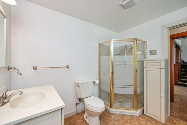 full bathroom featuring visible vents, a shower stall, toilet, and vanity