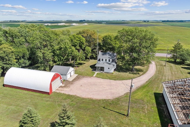 birds eye view of property with a rural view