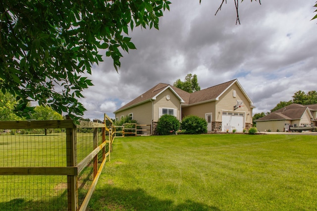 view of yard featuring a garage