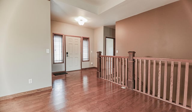 entrance foyer featuring hardwood / wood-style flooring