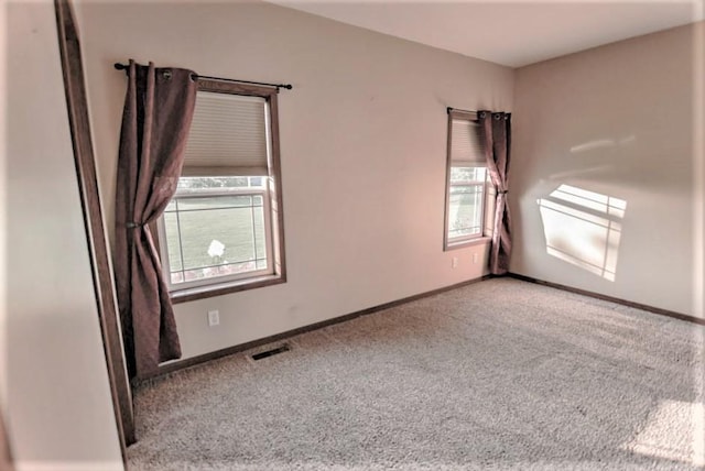 view of carpeted spare room