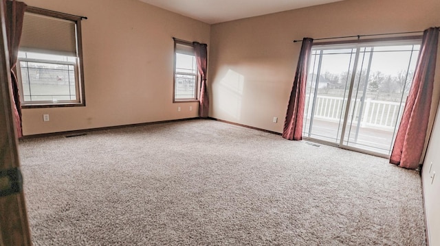 view of carpeted spare room