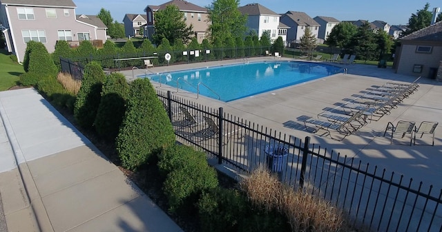 view of swimming pool featuring a patio